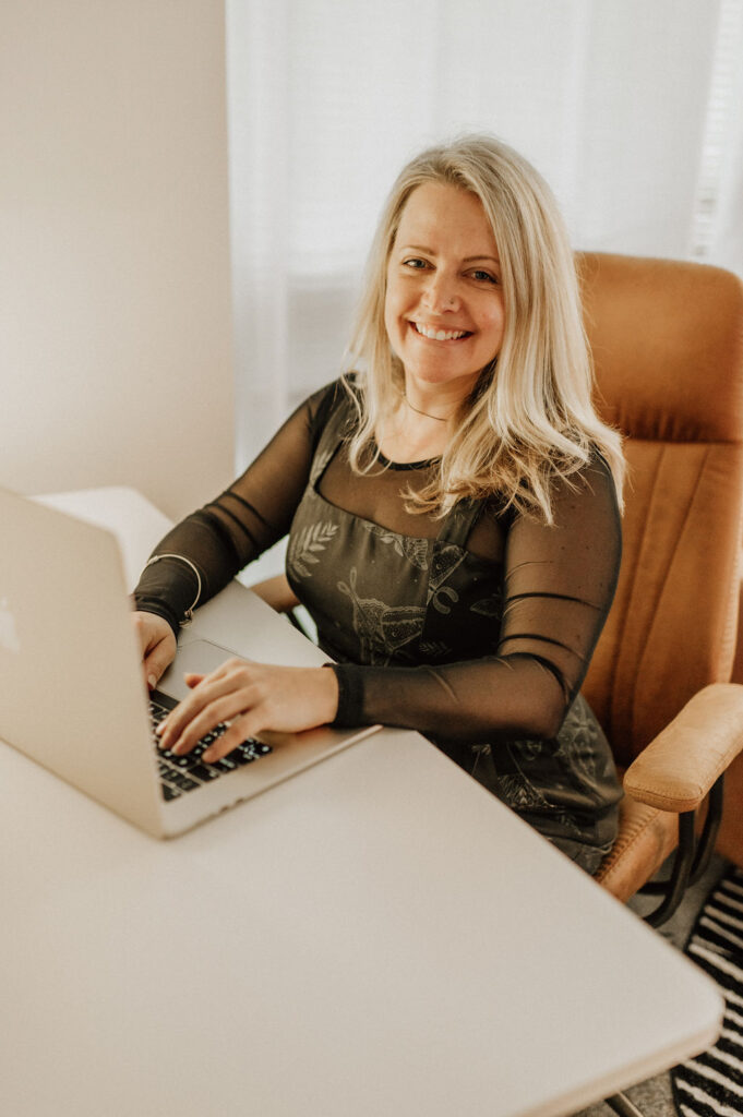 Mary Crutchfield at her office desk